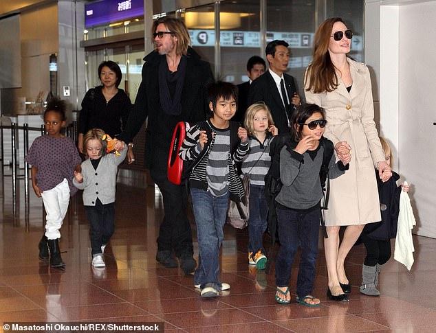 The movie stars, who met in 2004 while filming Mr. And Mrs. Smith, share six children together: sons Maddox, 22, Pax, 20, and Knox, 15, and daughters Zahara, 19, Shiloh, 17, and Vivienne, 15; seen November 8, 2011 in Tokyo