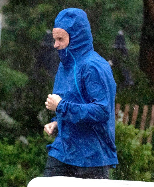 Angelina Jolie's ex-husband Jonny Lee Miller was seen out on a rainy jog the next morning after spending the evening with her