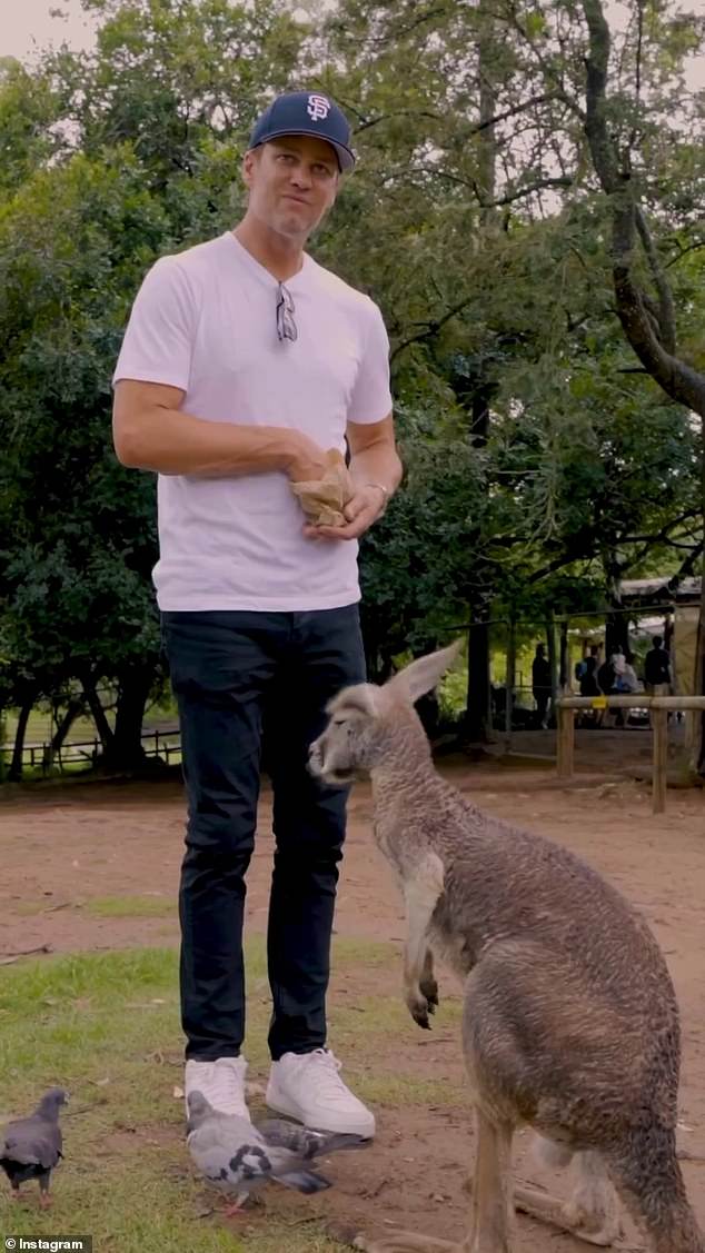 NFL legend Tom Brady, 46, (pictured) took some time out from his speaking engagements in Melbourne and Brisbane last week to meet some furry friends