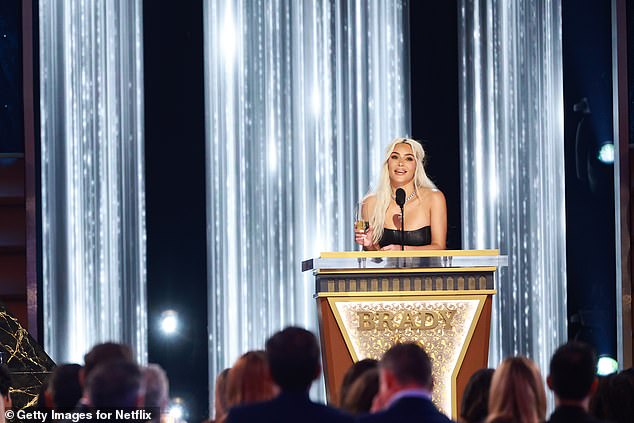 She appeared to be launching into a joke, telling Hart, 'I know a lot of people make fun of your height,' before appearing to do a double take at the outburst from her less than-adoring public