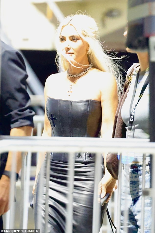 The reality star and mogul seemed unbothered by the boos, as she was seen leaving the event in a stylish black leather gown